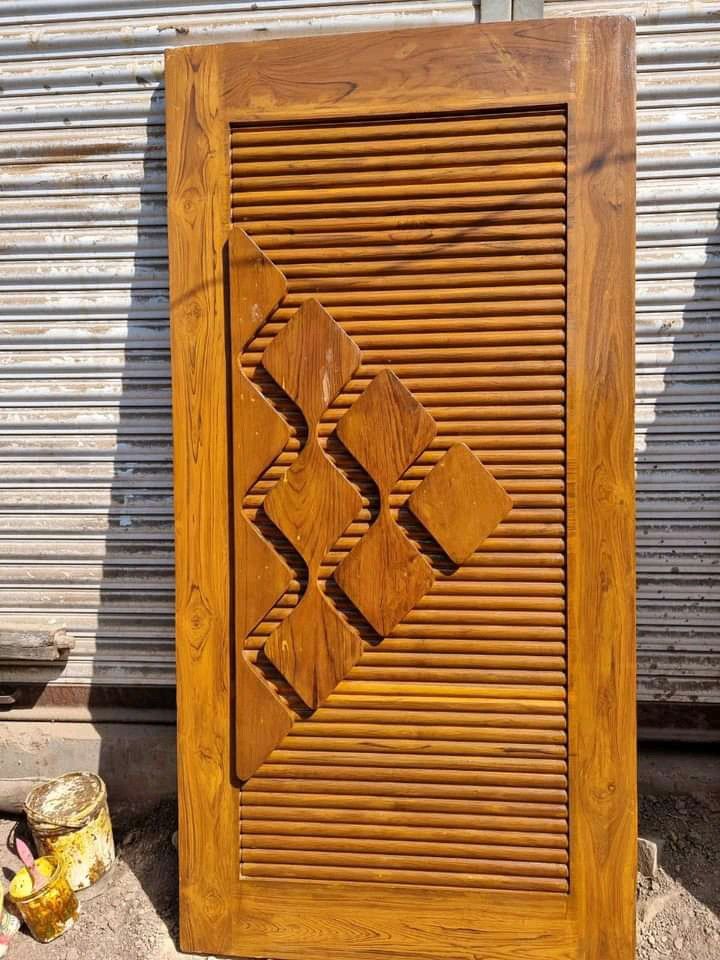 Contemporary Wooden Door with Geometric Carved Panel Design