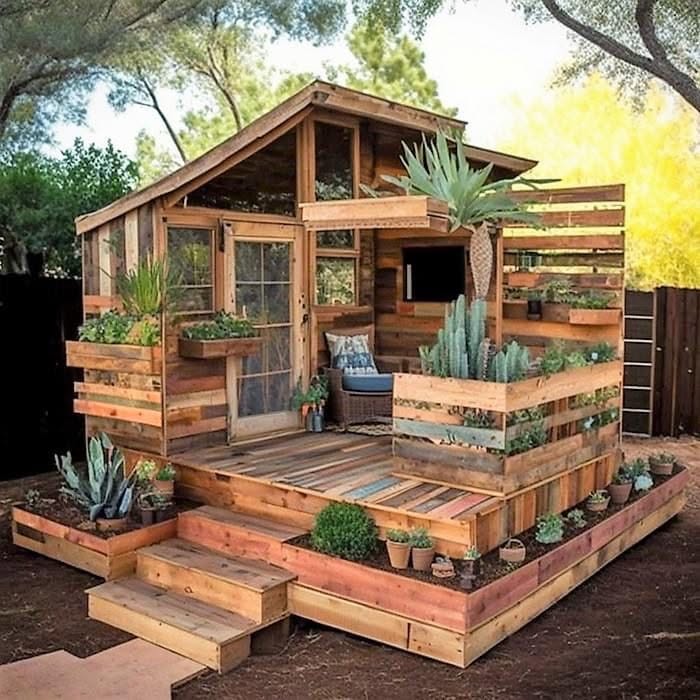 Rustic Wooden Backyard Cabin with Succulent Planter Deck