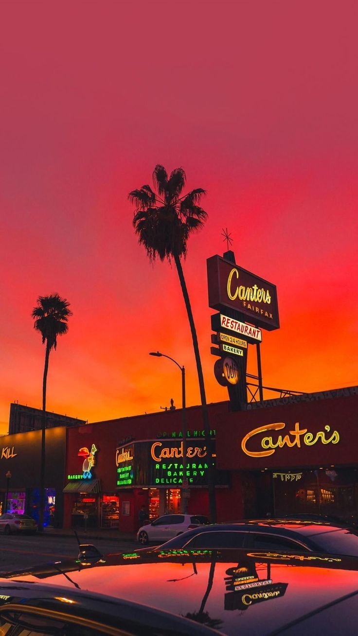 Retro Diner Neon Signs and Palm Trees at Sunset on Fairfax Avenue